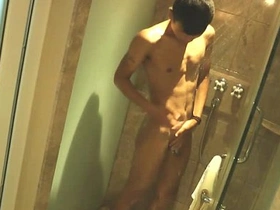 Gay shower scene with an Asian boy and a big cock