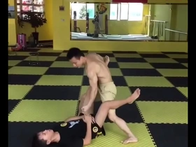 Twinks get their balls kicked in in an Asian-themed scene.