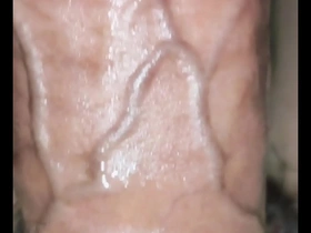 Solo boy with an incredible cock tries out toys and sucks it clean.