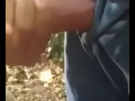 Young and straight Asian men having outdoor sex