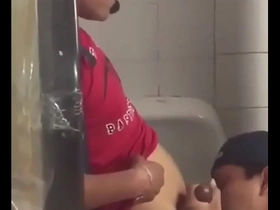 Gay blowjob in public restroom in an Asian gay movie