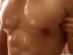 Gay bodybuilding Asian hunk gets oiled up