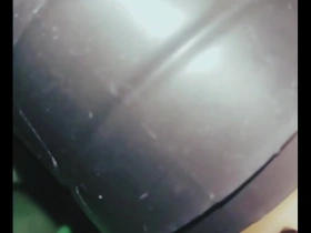 Asian man gets a facial with a toy