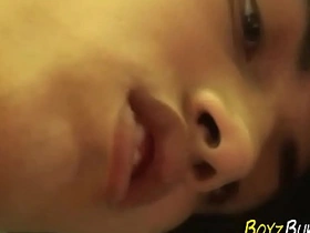 Young and straight twink gets a facial with an Asian partner in gay sex scene.